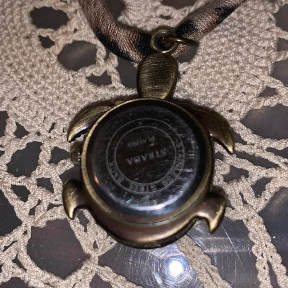 CUTE BRONZY TONED TURTLE WATCH BY STRADA needs a battery adjustable Pre owned